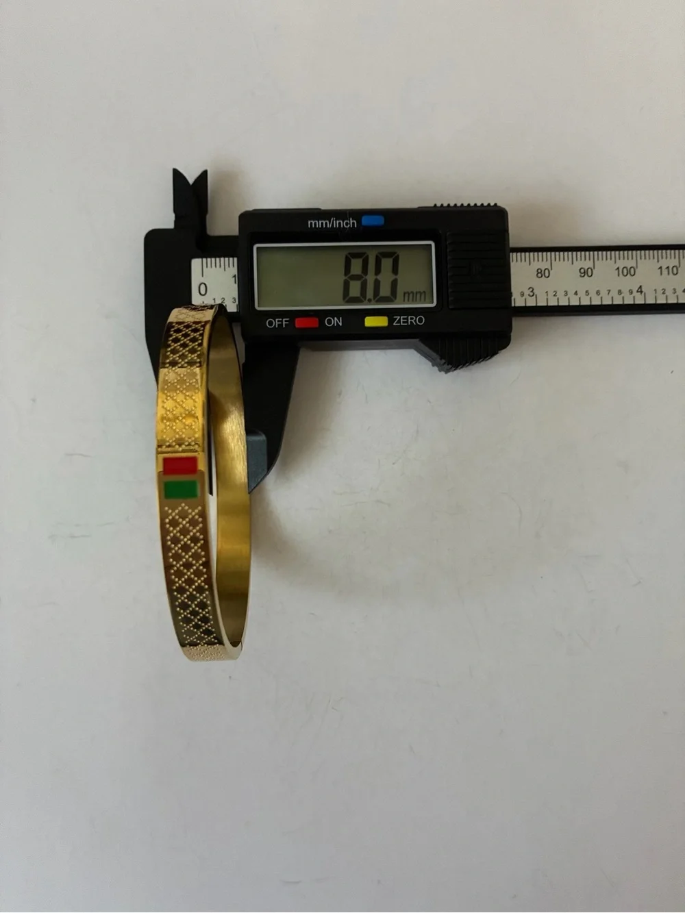 18K Gold Luxury Bangle with Green and Red Accents